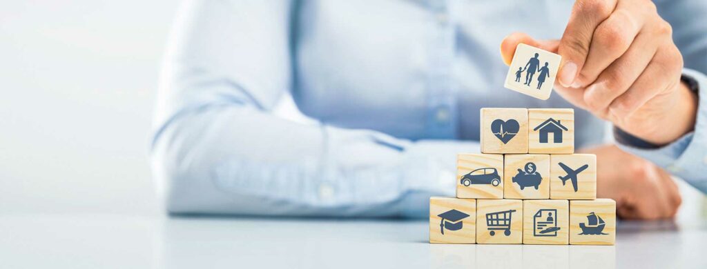 a man arranging cubes which contains symbol